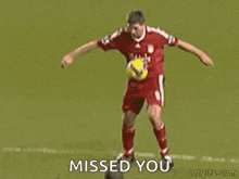 a soccer player is kicking another player in the face while another player says missed you .