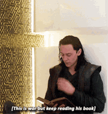 Loki Reading GIF - Loki Reading This Is War GIFs