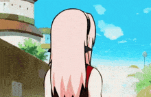 a cartoon girl with pink hair is standing in front of a castle .