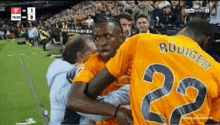 a soccer player with the number 22 on their jersey