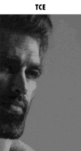 a black and white photo of a man with a beard and the words tce above him .