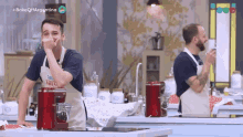 two men in aprons are standing in a kitchen with the words bake off argentina on the bottom left