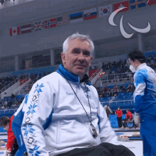 Waving Wheelchair Curling GIF - Waving Wheelchair Curling Andrei Koitmae GIFs