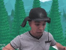 a man wearing a helmet and ear muffs in front of a forest