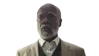 a man with a beard and a suit has the word no above his head