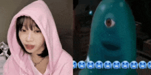 a girl in a pink hoodie is next to a blue monster