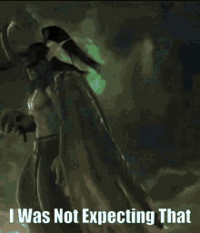 a blurred image with the words " i was not expecting that " at the bottom