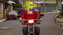 a man in a red shirt is riding a honda bike