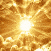 the sun is shining through the clouds and shining brightly