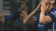 a man with a tattoo on his arm looks up at the sky sport live stream