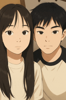 a boy and a girl pose for a picture together