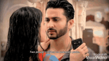 a man and a woman are looking at each other and the man says two people collided on unknown paths