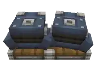 a stack of blue boxes on top of a wooden box