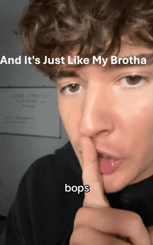 a close up of a person 's face with the words and it 's just like my brotha bops