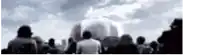 a blurry picture of a group of people walking
