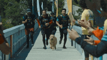 Racing To The Finish Line Mikael Lindnord GIF - Racing To The Finish Line Mikael Lindnord Mark Wahlberg GIFs