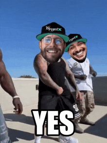 a group of men are dancing and one of them has the word yes on it