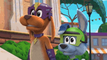 a dog and a rabbit wearing superhero costumes