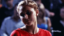 a close up of a woman 's face with the words abc family hd on the bottom