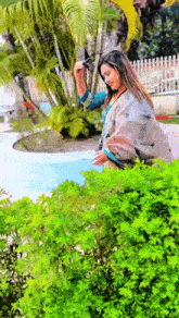 a woman taking a picture of herself with her phone