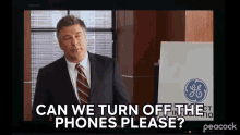 Can We Turn Off The Phones Please Jack Donaghy GIF - Can We Turn Off The Phones Please Jack Donaghy Alec Baldwin GIFs