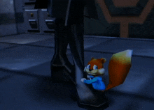 a cartoon squirrel in a blue shirt is standing next to a person 's leg