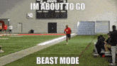 a man running on a football field with the words im about to go beast mode