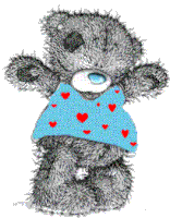 a teddy bear is wearing a blue shirt with red hearts on it