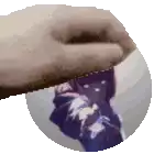 a hand is holding a cd with a picture of a person on it