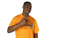 a man wearing an orange thrasher shirt dancing