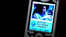 a cell phone displays a picture of a woman and the date jan27 005