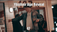 a man dancing with the words ybsilver age reveal written above him