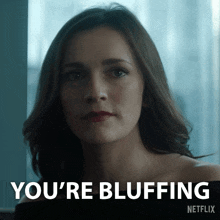 a woman says you 're bluffing next to a netflix logo