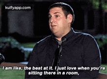 a man is sitting on a bench and saying i am like the best at it .