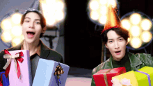 two men wearing party hats are holding presents in their hands