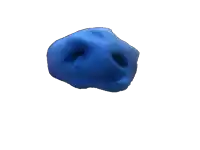 a blue ball with holes in it looks like a skull