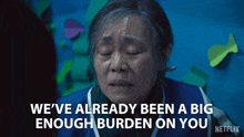 a netflix ad shows an elderly woman crying