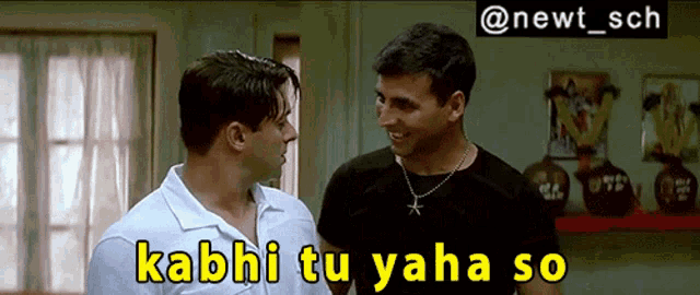 two men are standing next to each other with the caption kabhi tu yaha so