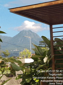 a photo of a mountain taken on june 26th