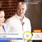 a man and a woman are standing next to each other on a screen that says copa america