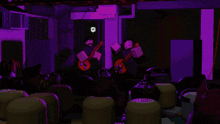 a group of people are standing in a dark room with a sign that says ' o ' on it