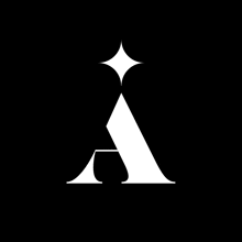 a white letter a on a black background with a star in the middle
