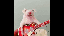 a pink rat is holding a red guitar in front of an explosion
