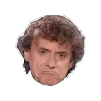 a close up of a man 's face with a sticker around it