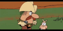 a cartoon character is holding a baby and blowing bubbles