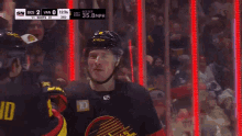 a hockey game between bos and van is being broadcast on sn