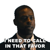 a man in a suit and bow tie says i need to call in that favor