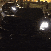 a black sports car with a license plate that says ' a ' on it