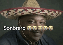 a man wearing a sombrero with the word sombrero written above him