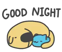 a sticker that says good night with a blue cat sleeping under a pillow